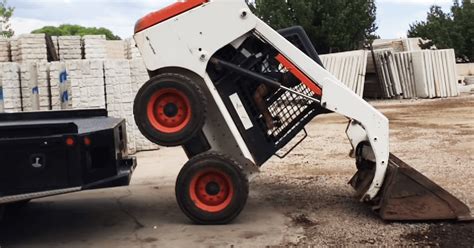 unloading skid steer without ramps|NO RAMPS .